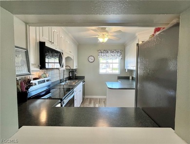 **FURNISHED END UNIT RIGHT ON THE MYERLEE COUNTRY CLUB GOLF on Myerlee Country Club in Florida - for sale on GolfHomes.com, golf home, golf lot