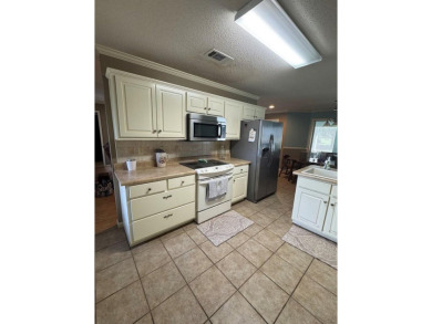 Discover comfortable Southern living in this spacious golf villa on Red Eagle Golf Course in Alabama - for sale on GolfHomes.com, golf home, golf lot