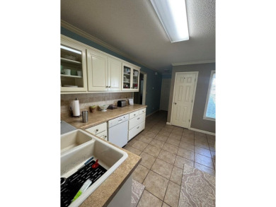 Discover comfortable Southern living in this spacious golf villa on Red Eagle Golf Course in Alabama - for sale on GolfHomes.com, golf home, golf lot