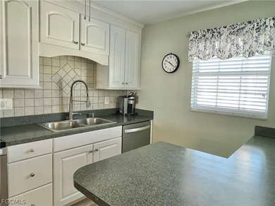 **FURNISHED END UNIT RIGHT ON THE MYERLEE COUNTRY CLUB GOLF on Myerlee Country Club in Florida - for sale on GolfHomes.com, golf home, golf lot