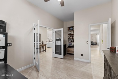 Just a golf cart ride from Seville Country Club, this on Seville Golf and Country Club in Arizona - for sale on GolfHomes.com, golf home, golf lot