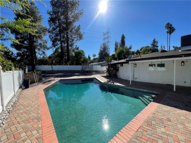 Modern luxury and masterful design and are uniquely embodied in on El Caballero Country Club in California - for sale on GolfHomes.com, golf home, golf lot