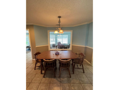 Discover comfortable Southern living in this spacious golf villa on Red Eagle Golf Course in Alabama - for sale on GolfHomes.com, golf home, golf lot