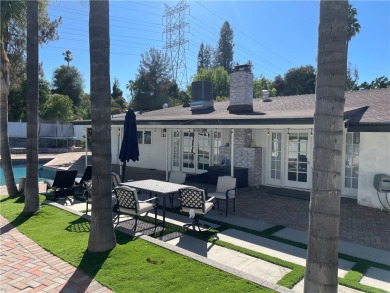 Modern luxury and masterful design and are uniquely embodied in on El Caballero Country Club in California - for sale on GolfHomes.com, golf home, golf lot