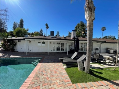 Modern luxury and masterful design and are uniquely embodied in on El Caballero Country Club in California - for sale on GolfHomes.com, golf home, golf lot