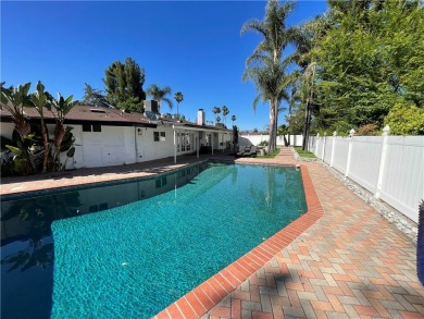 Modern luxury and masterful design and are uniquely embodied in on El Caballero Country Club in California - for sale on GolfHomes.com, golf home, golf lot