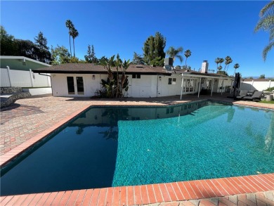 Modern luxury and masterful design and are uniquely embodied in on El Caballero Country Club in California - for sale on GolfHomes.com, golf home, golf lot