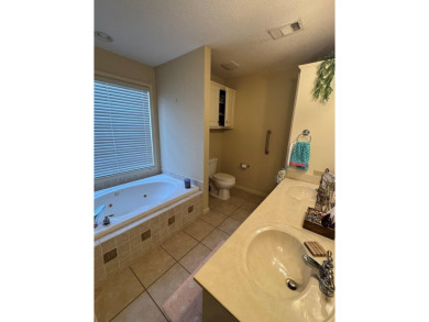 Discover comfortable Southern living in this spacious golf villa on Red Eagle Golf Course in Alabama - for sale on GolfHomes.com, golf home, golf lot