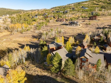 This stunning open Ranch plan is nestled at the end of a on Headwaters Golf Course At Granby Ranch in Colorado - for sale on GolfHomes.com, golf home, golf lot