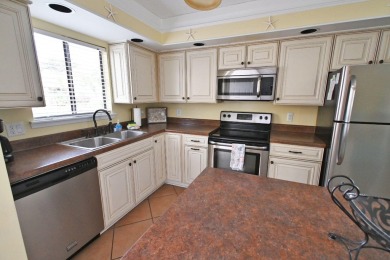 Experience coastal living at its finest in this beautifully on Sandpiper Cove Golf Course in Florida - for sale on GolfHomes.com, golf home, golf lot