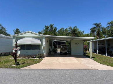 Welcome to this cozy and inviting home perfectly situated on a on Lake Henry Golf Club in Florida - for sale on GolfHomes.com, golf home, golf lot