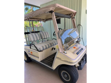 Welcome to this cozy and inviting home perfectly situated on a on Lake Henry Golf Club in Florida - for sale on GolfHomes.com, golf home, golf lot