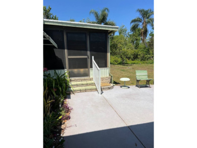 Welcome to this cozy and inviting home perfectly situated on a on Lake Henry Golf Club in Florida - for sale on GolfHomes.com, golf home, golf lot