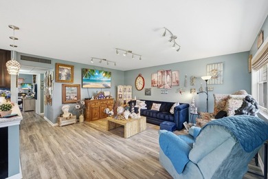 Absolutely stunning, fully updated ground-floor corner villa on Kings Point Golf -Flanders Way in Florida - for sale on GolfHomes.com, golf home, golf lot