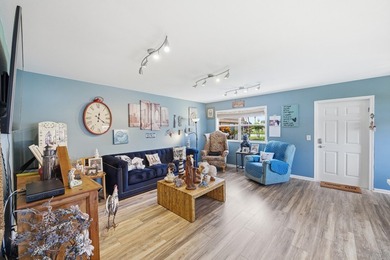 Absolutely stunning, fully updated ground-floor corner villa on Kings Point Golf -Flanders Way in Florida - for sale on GolfHomes.com, golf home, golf lot