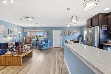 Absolutely stunning, fully updated ground-floor corner villa on Kings Point Golf -Flanders Way in Florida - for sale on GolfHomes.com, golf home, golf lot