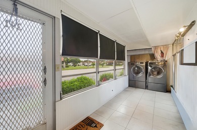 Absolutely stunning, fully updated ground-floor corner villa on Kings Point Golf -Flanders Way in Florida - for sale on GolfHomes.com, golf home, golf lot