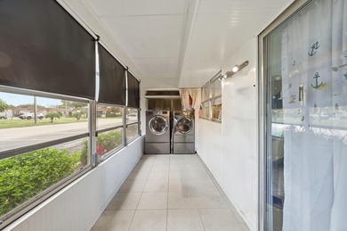 Absolutely stunning, fully updated ground-floor corner villa on Kings Point Golf -Flanders Way in Florida - for sale on GolfHomes.com, golf home, golf lot