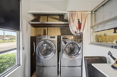 Absolutely stunning, fully updated ground-floor corner villa on Kings Point Golf -Flanders Way in Florida - for sale on GolfHomes.com, golf home, golf lot