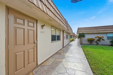 Absolutely stunning, fully updated ground-floor corner villa on Kings Point Golf -Flanders Way in Florida - for sale on GolfHomes.com, golf home, golf lot