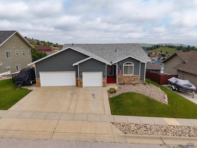 This beautiful four bedroom 3 bath home features LVP throughout on Fountain Springs Golf Club in South Dakota - for sale on GolfHomes.com, golf home, golf lot