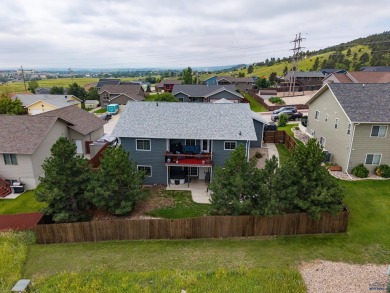 This beautiful four bedroom 3 bath home features LVP throughout on Fountain Springs Golf Club in South Dakota - for sale on GolfHomes.com, golf home, golf lot