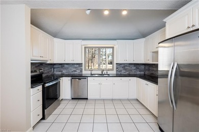 Beautiful and stately brick home. You're greeted into the home on Cypress Point Country Club in Virginia - for sale on GolfHomes.com, golf home, golf lot