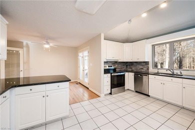 Beautiful and stately brick home. You're greeted into the home on Cypress Point Country Club in Virginia - for sale on GolfHomes.com, golf home, golf lot