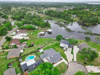 Welcome to waterfront living at its finest in beautiful Biloxi! on Sunkist Country Club, Inc. in Mississippi - for sale on GolfHomes.com, golf home, golf lot