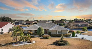 Rarely available water frontage sanctuary in Caloosa Country on Caloosa Greens Executive Golf Course in Florida - for sale on GolfHomes.com, golf home, golf lot