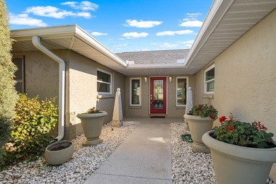 Rarely available water frontage sanctuary in Caloosa Country on Caloosa Greens Executive Golf Course in Florida - for sale on GolfHomes.com, golf home, golf lot
