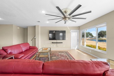 Rarely available water frontage sanctuary in Caloosa Country on Caloosa Greens Executive Golf Course in Florida - for sale on GolfHomes.com, golf home, golf lot