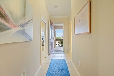 This beautifully updated second-floor home in Esplanade Lakewood on Esplanade Golf and Country at Lakewood Ranch in Florida - for sale on GolfHomes.com, golf home, golf lot