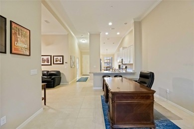 This beautifully updated second-floor home in Esplanade Lakewood on Esplanade Golf and Country at Lakewood Ranch in Florida - for sale on GolfHomes.com, golf home, golf lot