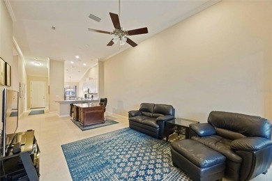 This beautifully updated second-floor home in Esplanade Lakewood on Esplanade Golf and Country at Lakewood Ranch in Florida - for sale on GolfHomes.com, golf home, golf lot