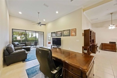 This beautifully updated second-floor home in Esplanade Lakewood on Esplanade Golf and Country at Lakewood Ranch in Florida - for sale on GolfHomes.com, golf home, golf lot