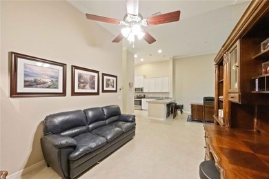 This beautifully updated second-floor home in Esplanade Lakewood on Esplanade Golf and Country at Lakewood Ranch in Florida - for sale on GolfHomes.com, golf home, golf lot
