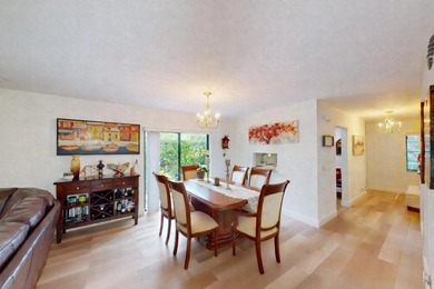 Beautifully renovated corner residence located in the highly on Boca Lago Golf and Country Club in Florida - for sale on GolfHomes.com, golf home, golf lot