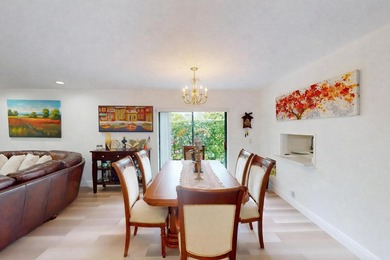 Beautifully renovated corner residence located in the highly on Boca Lago Golf and Country Club in Florida - for sale on GolfHomes.com, golf home, golf lot