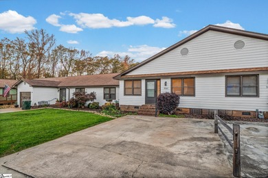 This inviting two-bedroom, two-bath townhome combines comfort on Smithfields Country Club in South Carolina - for sale on GolfHomes.com, golf home, golf lot