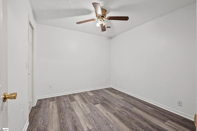 This inviting two-bedroom, two-bath townhome combines comfort on Smithfields Country Club in South Carolina - for sale on GolfHomes.com, golf home, golf lot