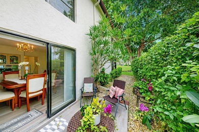 Beautifully renovated corner residence located in the highly on Boca Lago Golf and Country Club in Florida - for sale on GolfHomes.com, golf home, golf lot