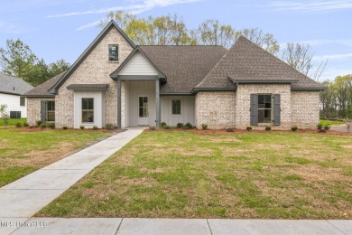 Welcome home to this beautiful new construction home in on Lake Caroline Golf Club in Mississippi - for sale on GolfHomes.com, golf home, golf lot