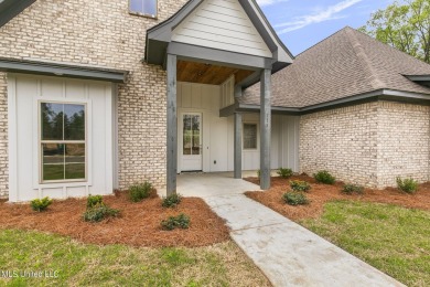 Welcome home to this beautiful new construction home in on Lake Caroline Golf Club in Mississippi - for sale on GolfHomes.com, golf home, golf lot