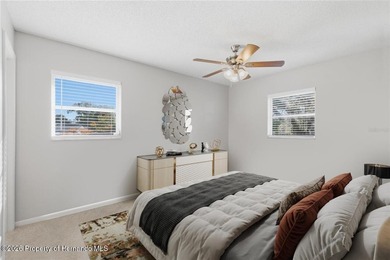 Move right into this thoughtfully updated 2 bedroom, 1.5 on Oak Hills Country Club in Florida - for sale on GolfHomes.com, golf home, golf lot