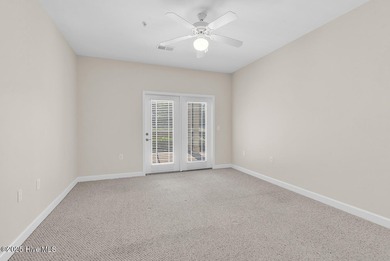 Welcome to this desirable first-floor condo located along the on Crow Creek Golf Club in North Carolina - for sale on GolfHomes.com, golf home, golf lot