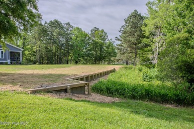 This picturesque property with a newly updated dock and new on Sound Golf Links at Albemarle Plantation in North Carolina - for sale on GolfHomes.com, golf home, golf lot