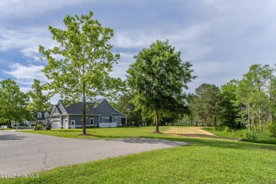 This picturesque property with a newly updated dock and new on Sound Golf Links at Albemarle Plantation in North Carolina - for sale on GolfHomes.com, golf home, golf lot