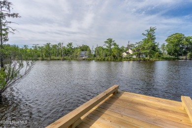 This picturesque property with a newly updated dock and new on Sound Golf Links at Albemarle Plantation in North Carolina - for sale on GolfHomes.com, golf home, golf lot