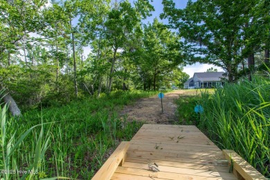 This picturesque property with a newly updated dock and new on Sound Golf Links at Albemarle Plantation in North Carolina - for sale on GolfHomes.com, golf home, golf lot
